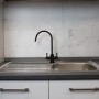 Two-way mixer tap in black stainless steel