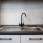 Two-way mixer tap in black stainless steel
